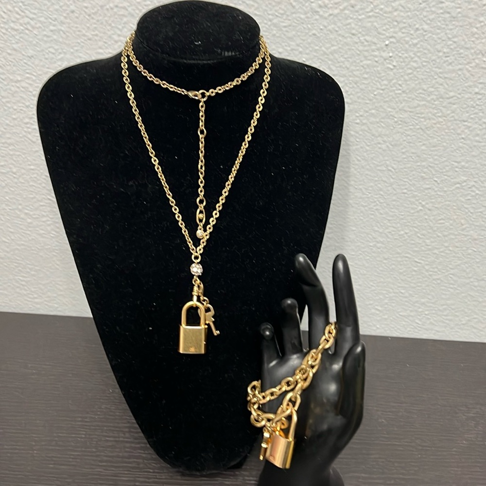CAbi Gold Tone Lock with Key Necklace and Bracelet.